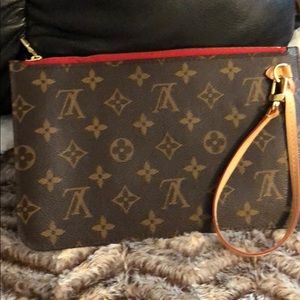 Brand new neverfull pouch